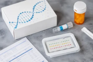 GeneSight testing kit with DNA graphic, medication bottle, and pharmacogenomic lab tools used to improve mental health medication selection and personalized treatment.